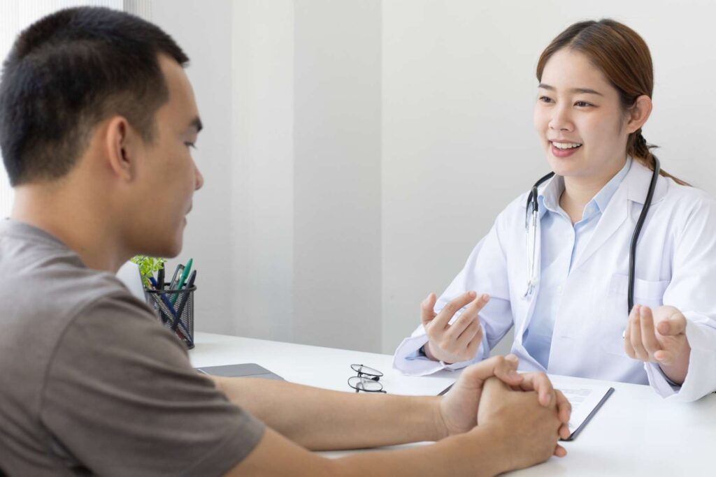 patient talking to pharmacist